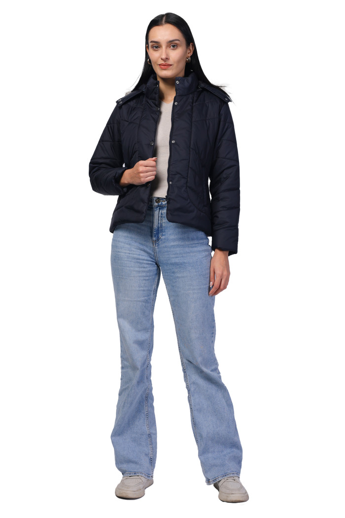 A model showcasing Women Quilted Jacket In Polyester Fabric With Removable Hood thumbnail.